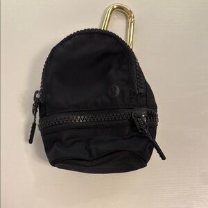 Black Lululemon Backpack keychain with gold carabiner